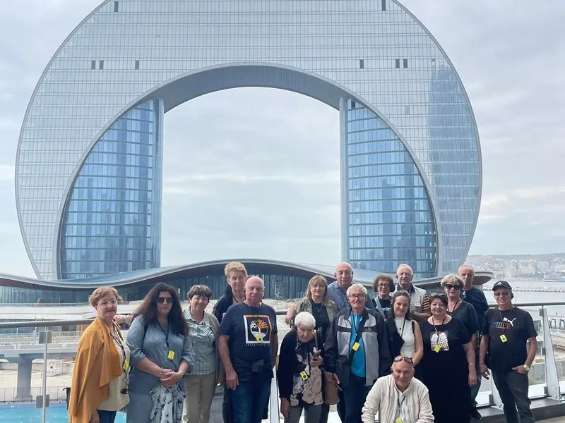 Tour group using an Israstar radioguide