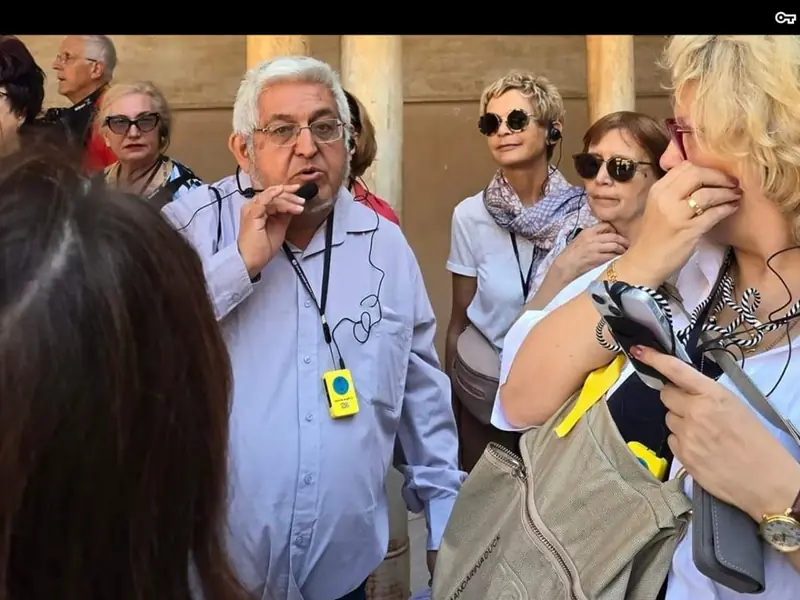 Tour group using an Israstar radioguide